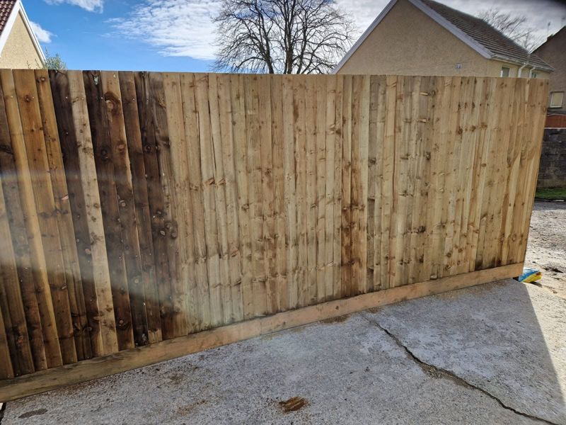 Close-board fence panels and gravel boards