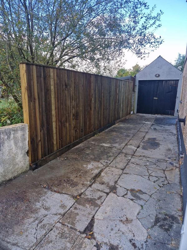 Fencing along a garage path