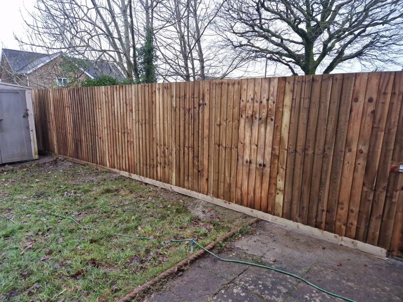 Long run of close-board fencing