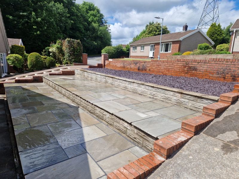 Front garden patio with brick walls